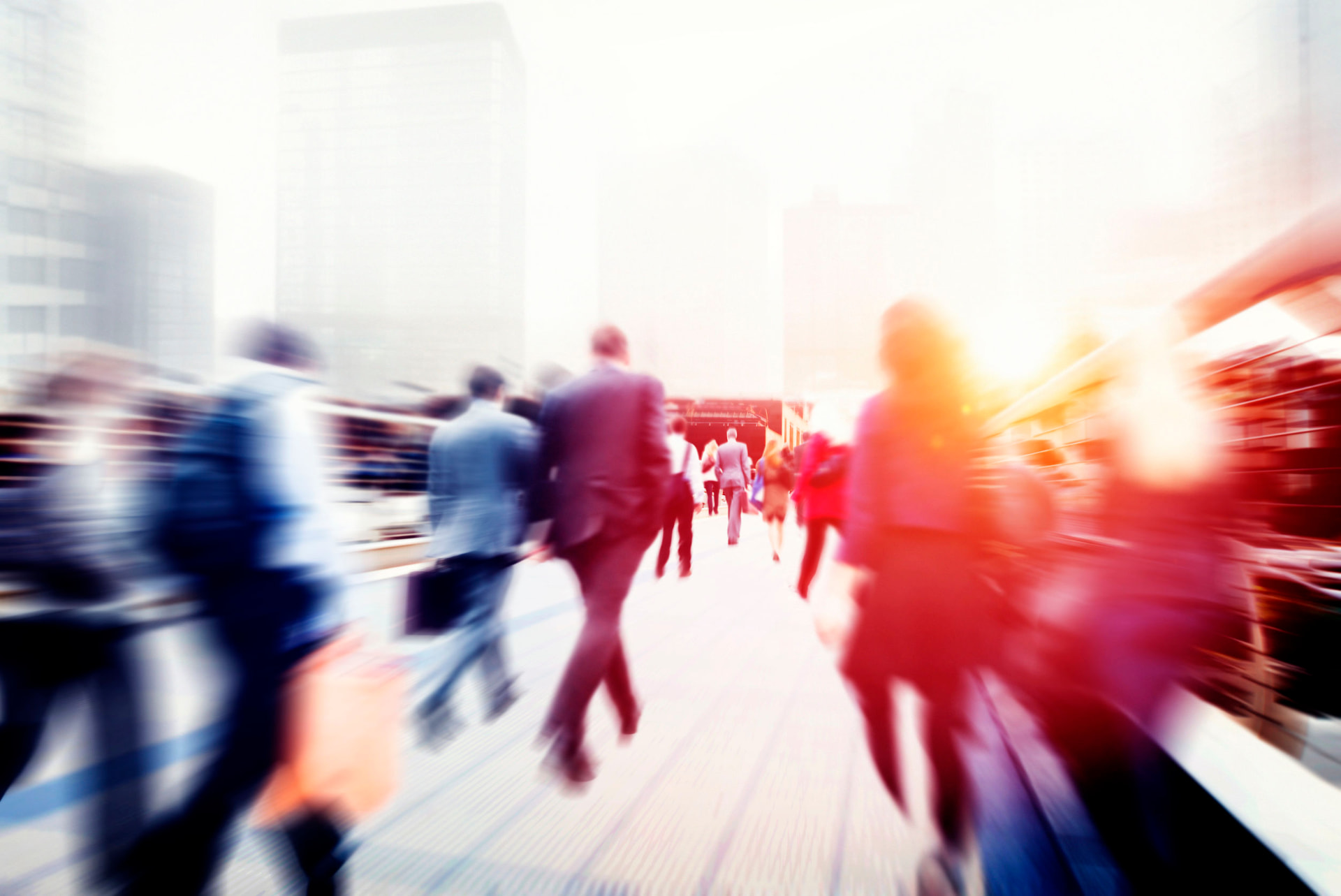 Professionals commuting to work in a busy city, representing AP Professionals talent nationwide